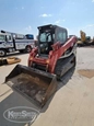 Used Takeuchi in yard